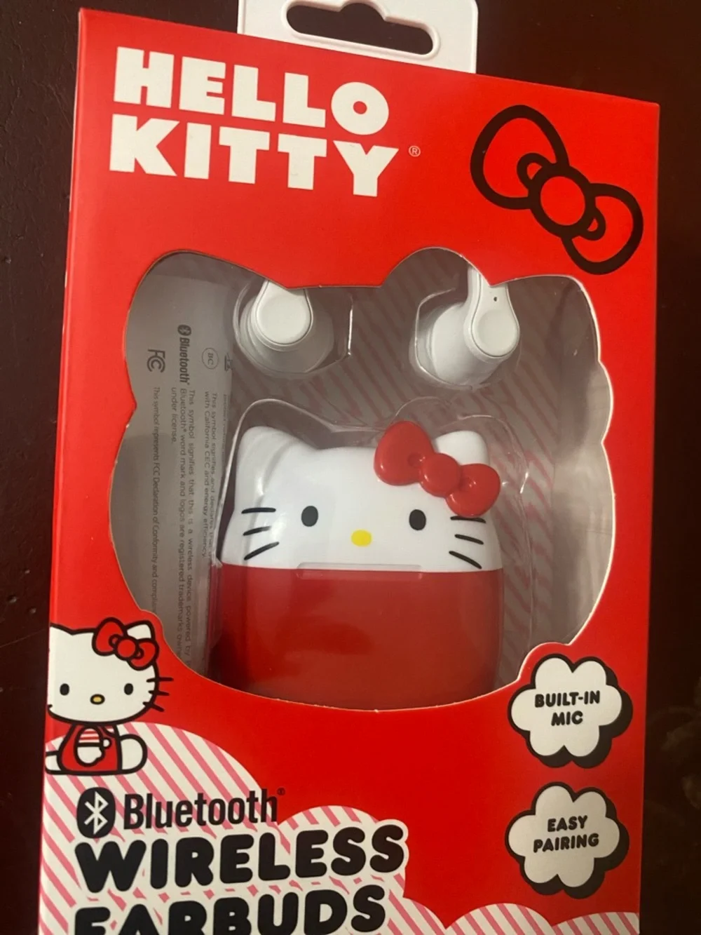 Hello Kitty Red and White Bluetooth Earbuds with Character Charging Case